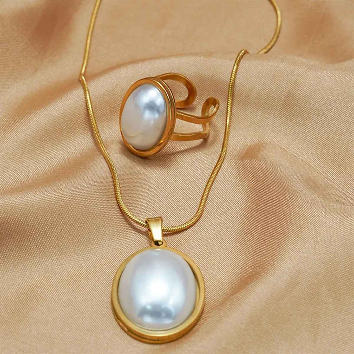 Lxalry Golden Jewelry Set - Elegant Necklace & Ring Combo With Oval Design, Metal Polished Finish - Mohamed jewelry My Store